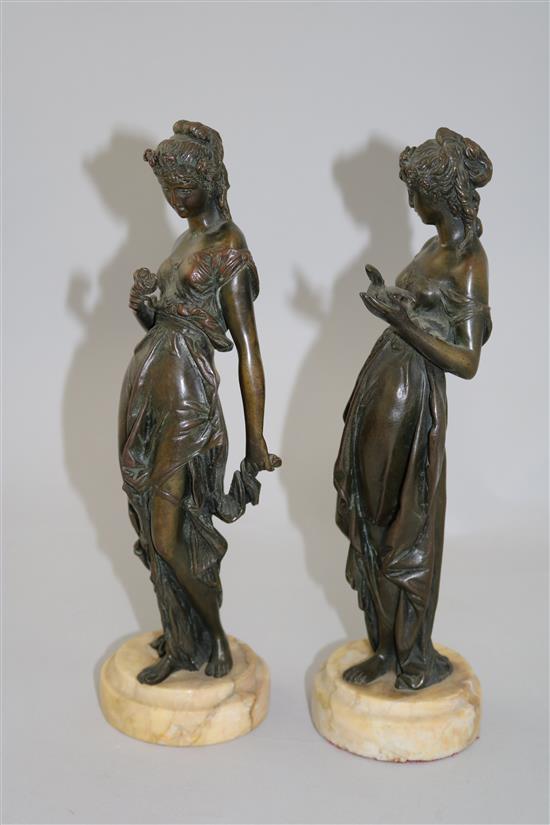 A pair of late 19th century French bronze figures of classical maidens, 11in.